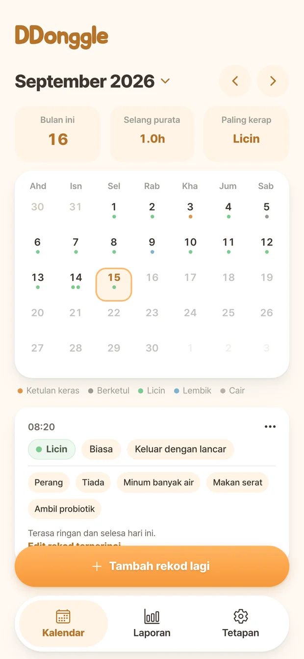 Skrin kalendar Ddonggle yang memaparkan catatan buang air besar mengikut tarikh